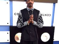 Hip-Hop musicians wearing chucks.  Snoop Dogg wearing black and white chucks.