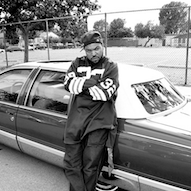 Ice Cube  A photo that Ice Cube tweeted out featuring him in front of a lowrider wearing chucks.