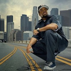 Ice Cube  Ice Cube in blue chucks in front of the LA skyline.