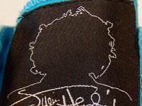 Jimi Hendrix High Top Chucks  Closeup view of the embroidered tongue on a Jimi Hendirx album cover print high top.