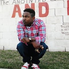 Kendrick Lamar  Kendrick poses in red chucks for his debut album Good Kid, M.A.A.D City.