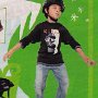Ads With Little Kids Wearing Chucks  Skateboarder wearing black chucks.