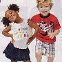 Ads With Little Kids Wearing Chucks  A boy and girl wearing pink and black chucks.
