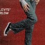 Ads for Levis and Jeans  Ad for Levis with black low cut chucks.