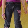 Ads for Levis and Jeans  Ad for patched blue Levis showing purple chucks with purple laces.