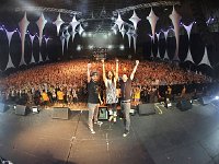 Linkin Park  On stage pose with their fans.