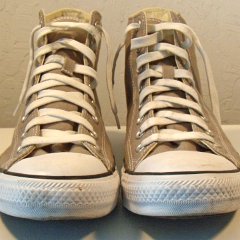 Worn Light Grey High Top Chucks  Front view of the light grey high tops.