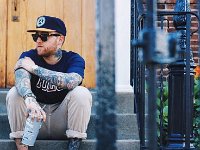 Mac Miller  Just chillin’ in some black low tops.
