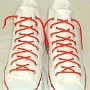 Narrow Round Shoelaces  Optical white high tops with narrow red laces.