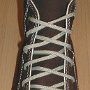 Narrow Round Shoelaces  Chocolate brown high top with narrow tan laces.
