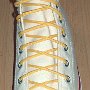 Narrow Round Shoelaces  Natural white high top with narrow yellow laces.
