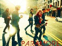 Paramore  The band walking across a city street.