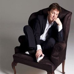 Paul McCartney  Sir Paul McCartney sitting in chucks.