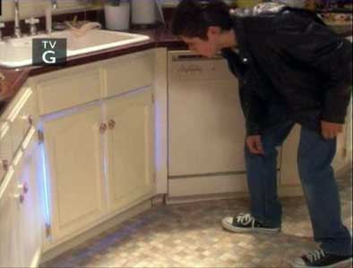 Phil checks out a strange light coming from under the sink.
