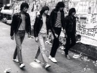 The Ramones  Johnny, Joey, Dee Dee, and Tommy Ramone walking on a street.