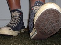 The Ramones High Top Chucks  Stepping out in a pair of Ramone's high tops with hemp laces, front view.