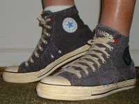 The Ramones High Top Chucks  Stepping out in a pair of Ramone's high tops with hemp laces, left side view.