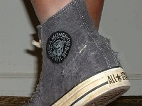 The Ramones High Top Chucks  Stepping out in a pair of Ramone's high tops with hemp laces, rear view.