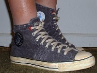 The Ramones High Top Chucks  Stepping out in a pair of Ramone's high tops with hemp laces, right side view.
