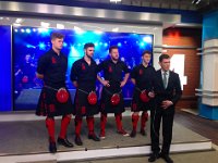 Red Hot Chili Pipers  Four band members posed at a media event.