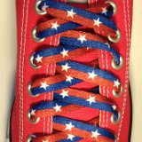 Red, White and Blue Shoelaces on Chucks  Red low top chuck with Red and Blue Stripe plus White Star print shoelaces.
