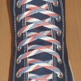 Red, White and Blue Shoelaces  Navy blue high top chuck with red, white and blue weave shoelaces.