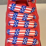 Red, White and Blue Shoelaces  Red high top chuck with wide print red, white and blue shoelaces.