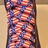 Red, White and Blue Shoelaces  Navy Blue high top chuck with wide print red, white and blue shoelaces.