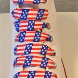 Red, White and Blue Shoelaces  Optical white high top chuck with wide print red, white and blue shoelaces.