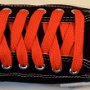 Orange Retro Shoelaces  Black low top chuck with orange retro shoelaces.