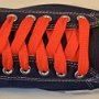 Orange Retro Shoelaces  Navy blue low top chuck with orange retro shoelaces.