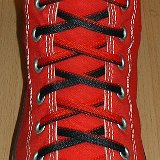 Reversible Shoelaces On Chucks  Red high top with black and red reversable laces.