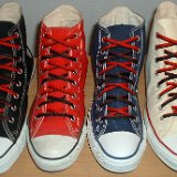 Reversible Shoelaces On Chucks  Core color high tops with black and red reversable laces.