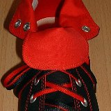 Reversible Shoelaces On Chucks  Black and red rolldown high top with black and red reversable laces.