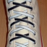 Reversible Shoelaces On Chucks  Natural white high top with black and white reversable laces.