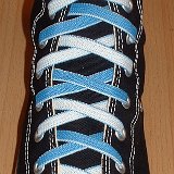 Reversible Shoelaces On Chucks  Black high top with Carolina blue and white reversable laces.
