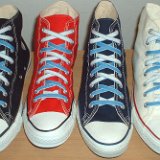 Reversible Shoelaces On Chucks  Core color high tops with Carolina blue and white reversable laces.