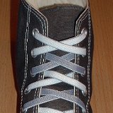 Reversible Shoelaces On Chucks  Gray high top with gray and white reversable laces.