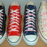 Reversible Shoelaces On Chucks  Core color high tops with pink and white reversable laces.