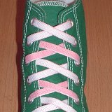Reversible Shoelaces On Chucks  Celtic green high top with pink and white reversable laces.