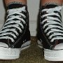 Rock and Roll High Top Chucks  Wearing black Grateful Dead high tops, front view 1.
