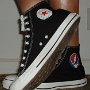 Rock and Roll High Top Chucks  Wearing black Grateful Dead high tops, left side view 2.