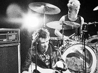 The Sex Pistols  Sid Vicious playing bass.