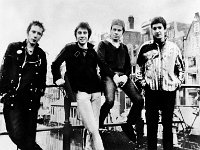 The Sex Pistols  British punk rock band the Sex Pistols in Amsterdam, January, 1977.  From left to right:  Johnny Rotten, Glen Matlock, Paul Cook, and Steve Jones.  (AP Photo) : band, entertainment, music, pose, punk, rock, rock, and, roll, rock, 'n, roll