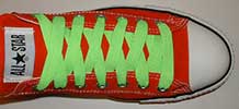 Neon lime retro shoelaces on red low top chucks
