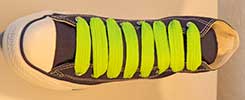 Neonlime extra fat shoelaces on a black high top