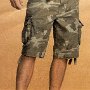 Ads for Shorts  Ad for camouflage cargo shorts with black low cut chucks.