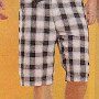 Ads for Shorts  Ad for plaid shorts with black low cut chucks.
