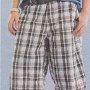 Ads for Shorts  Ad for plaid shorts with gray low cut chucks.