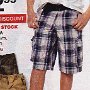 Ads for Shorts  Ad for plaid shorts with black low cut chucks.
